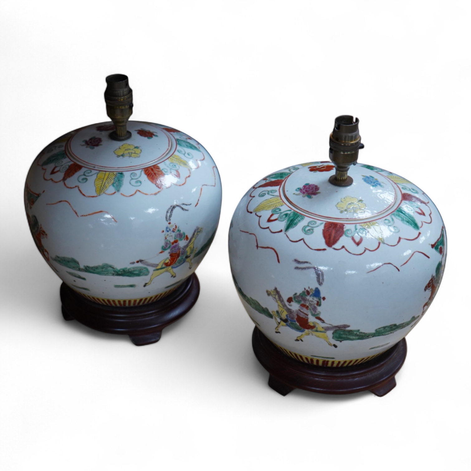 A pair of Chinese jar and covers on stands, converted later to lamps, 34cm including fittings.